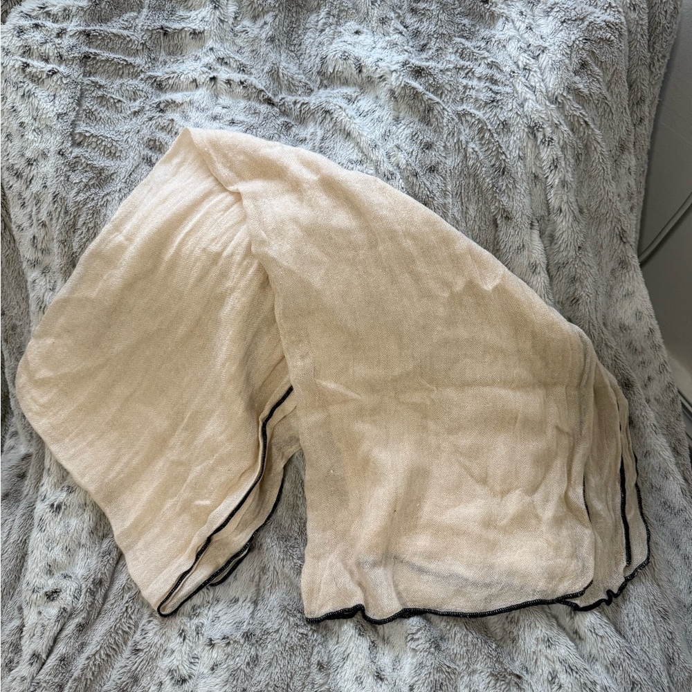 Elegant Cream Scarf with Black Trim